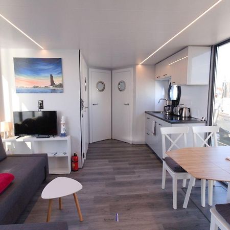Hausboot Fjord Lacerta Mit Dachterrasse In Wendtorf Bagian luar foto