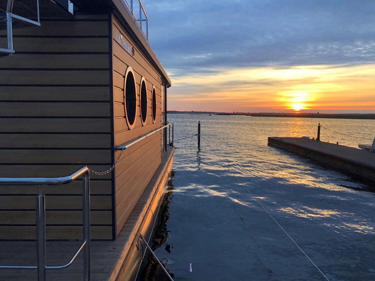 Hausboot Fjord Lacerta Mit Dachterrasse In Wendtorf Bagian luar foto