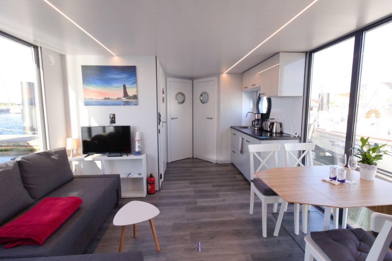 Hausboot Fjord Lacerta Mit Dachterrasse In Wendtorf Bagian luar foto