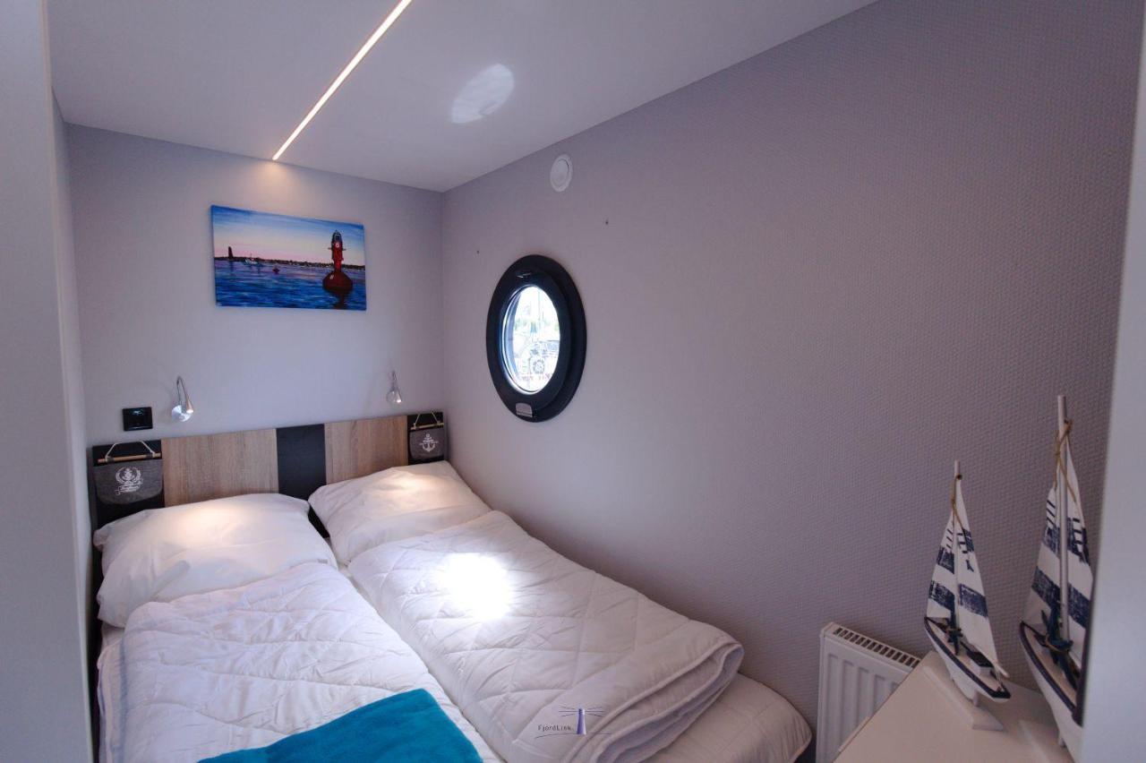 Hausboot Fjord Lacerta Mit Dachterrasse In Wendtorf Bagian luar foto